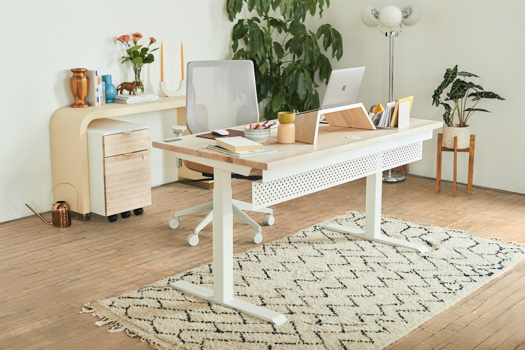 Two person home office with desks positioned back to back against opposite walls